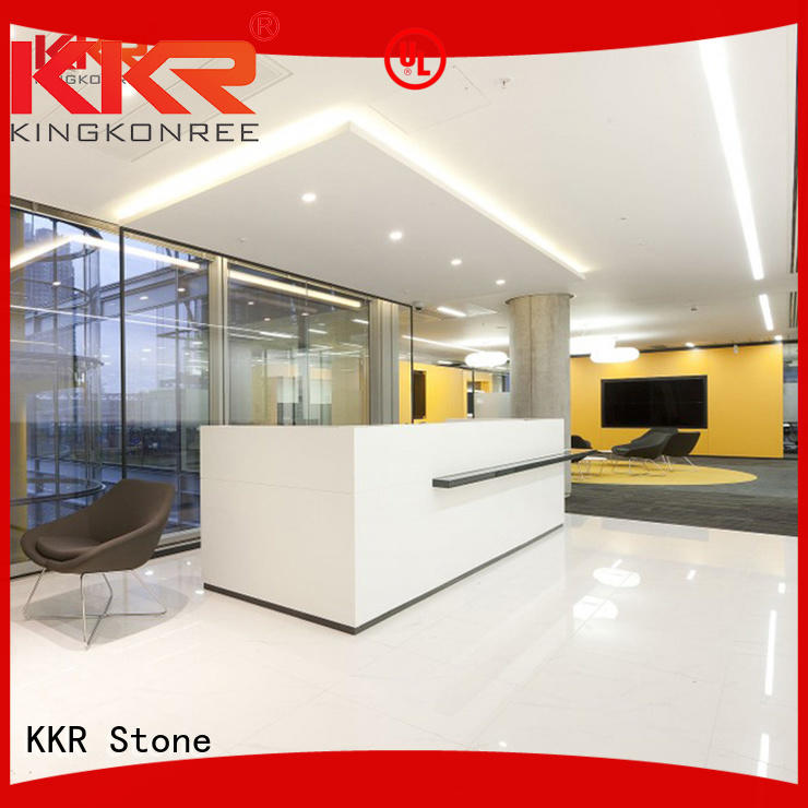 curved reception desk unique for building KKR Stone